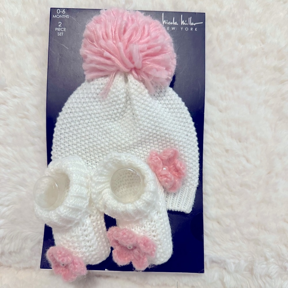 Brand-new with tags! Adorable hat and bootie set for babies, size 0-6 months.